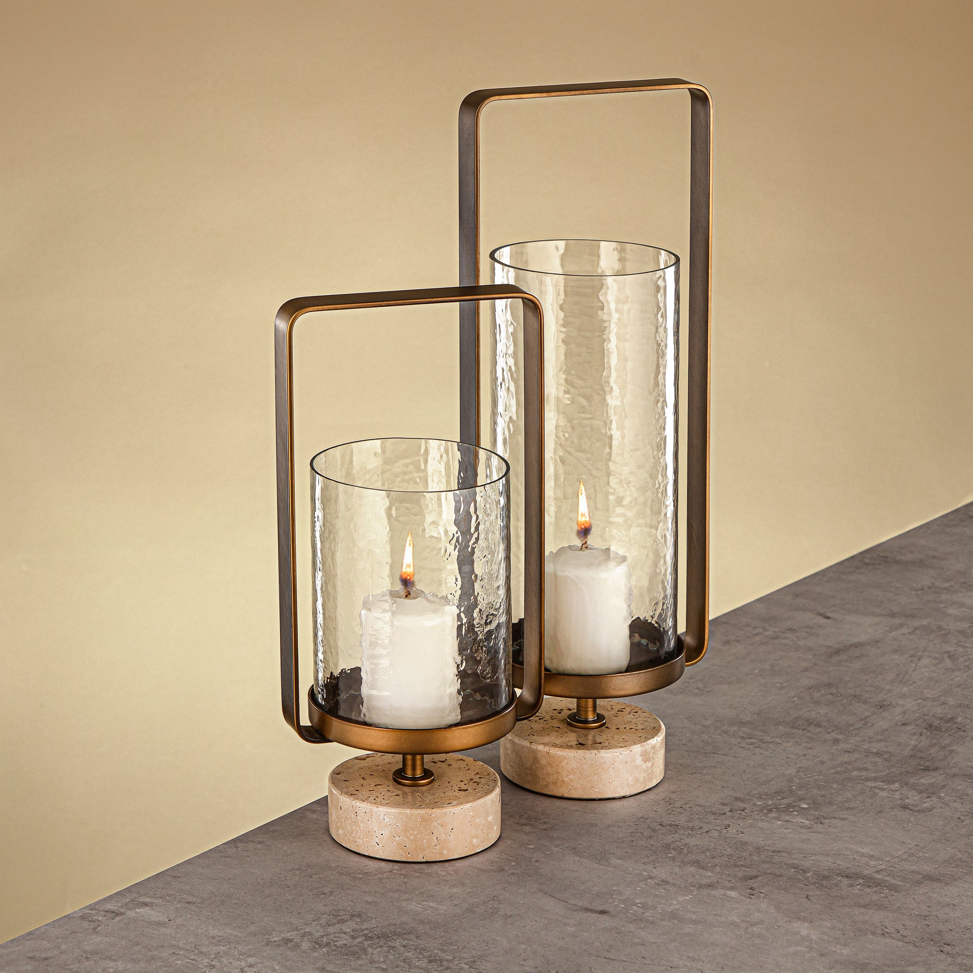 Almarjan Kalon Hurricane Lantern Hammered Clear Glass 15.5x12.5x32.5 CM Brushed Gold & Travertine Base (GMT2960025)